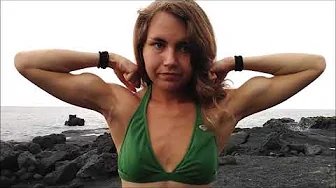 GIRLS FLEAXING MUSCLES AND ARMWRESTLING