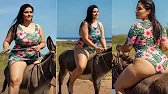 Stylish Beach Ride Woman Rides Tiny Donkey Like a Pro!